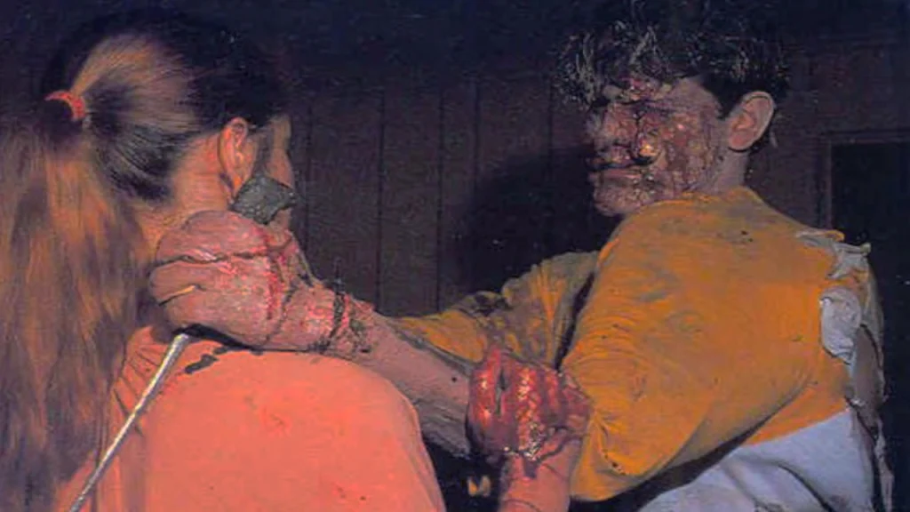 Bruce Campbell as the demon monster and Ellen Sandweiss in Sam Raimi's 1978 short horror film Within the Woods.